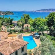 Drone photo of a villa in Porto Cheli with beautiful blue sea and green trees
