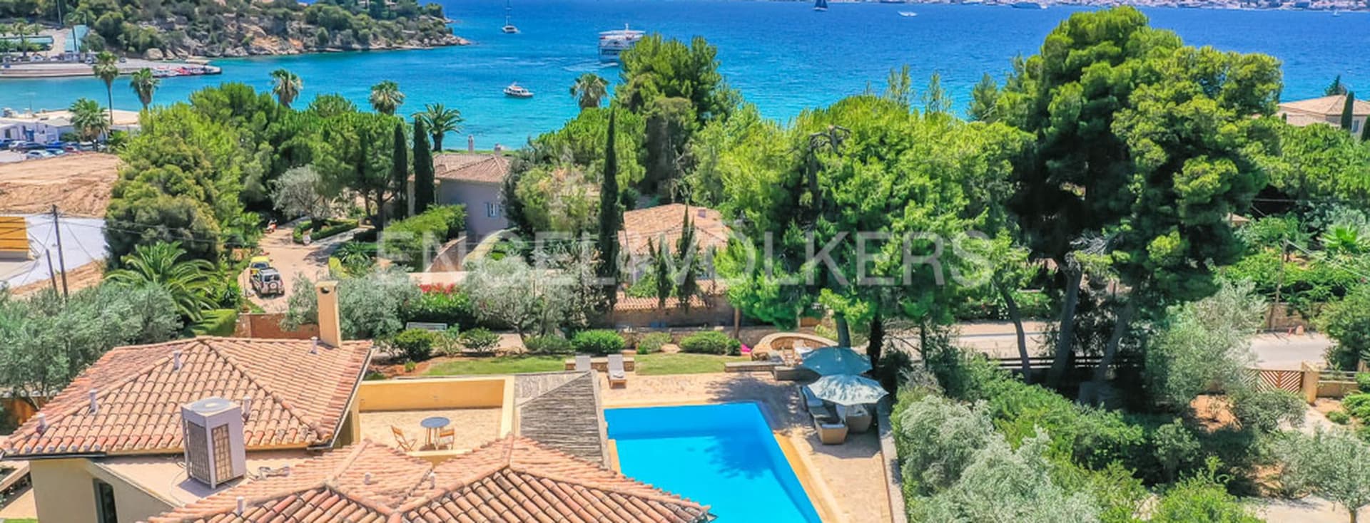 Drone photo of a villa in Porto Cheli with beautiful blue sea and green trees