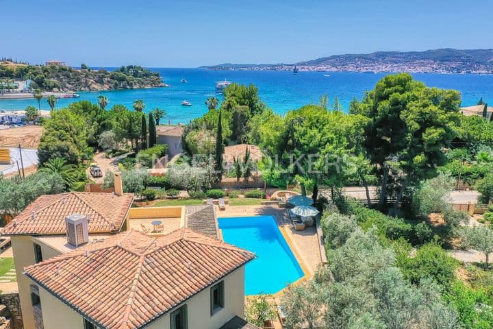 Drone photo of a villa in Porto Cheli with beautiful blue sea and green trees