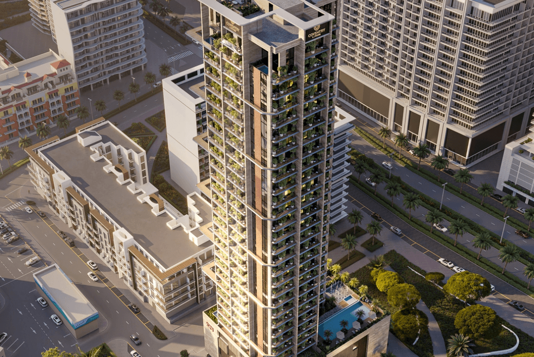 Coventry Living by GFS Developments with sunset lighting across the tower’s contemporary elevations and planted balconies.