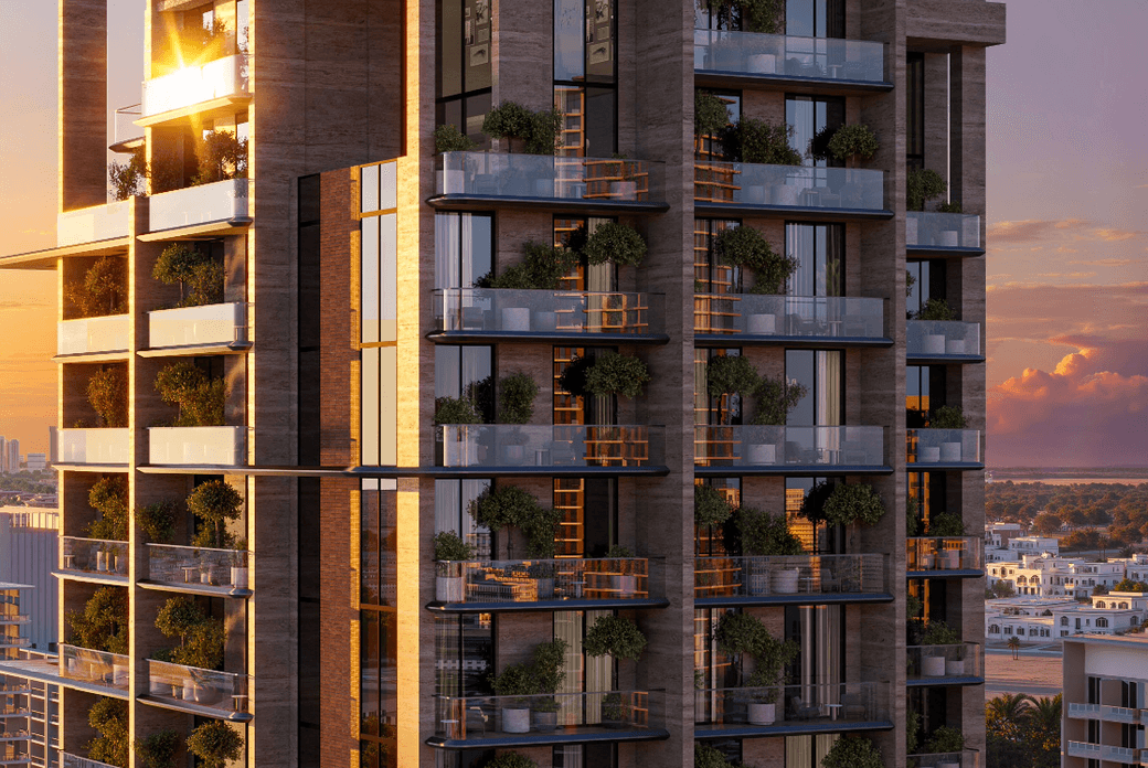 Exterior view of Coventry Living in Jumeirah Village Circle, showing the modern façade, glass balconies and landscaped terraces.