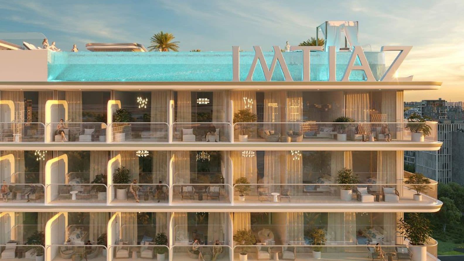 Nahaufnahme der Balkone von Cove Edition 6 von Imtiaz Developers in Dubailand mit geschwungenen Glasgeländern, Sitzgelegenheiten im Freien und Blumentöpfen.