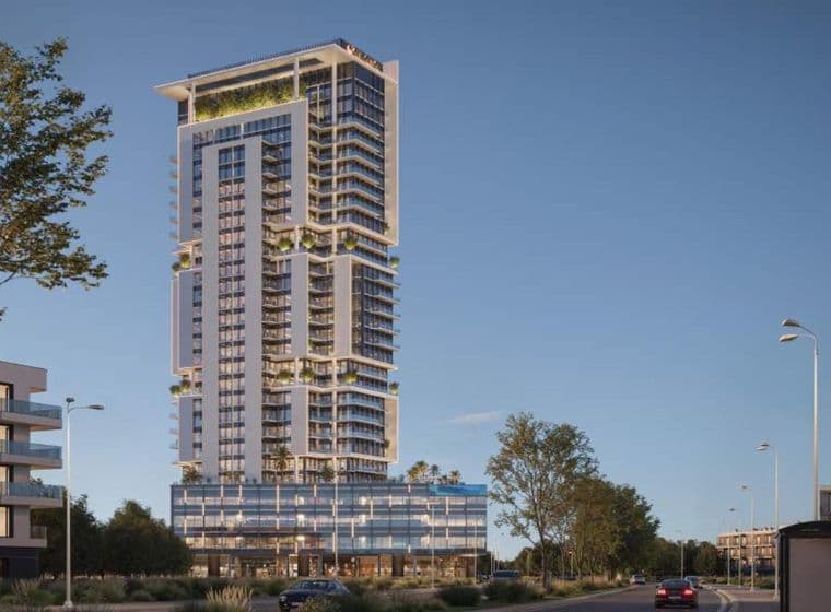 Exterior view of Samana Barari Avenue’s iconic residential tower surrounded by greenery, showcasing a modern architectural design with private balconies.