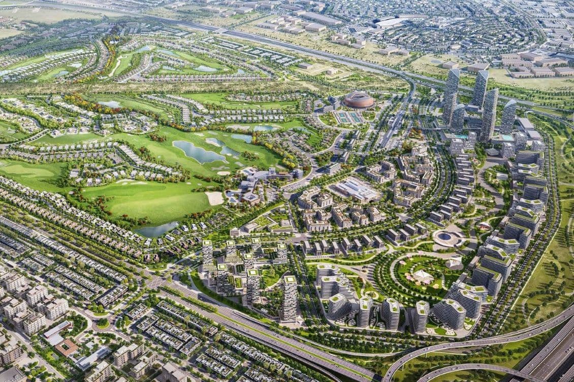Aerial masterplan of Jumeirah Golf Estates with residential clusters, golf courses, and community facilities, highlighting the expansive layout and integrated urban design.
