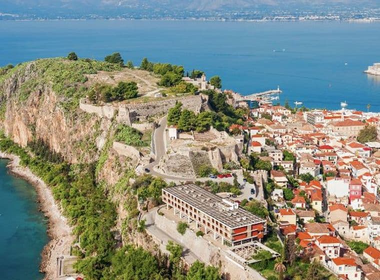 Aerial view of Nafplio with historic fortress, coastal town, and panoramic sea views