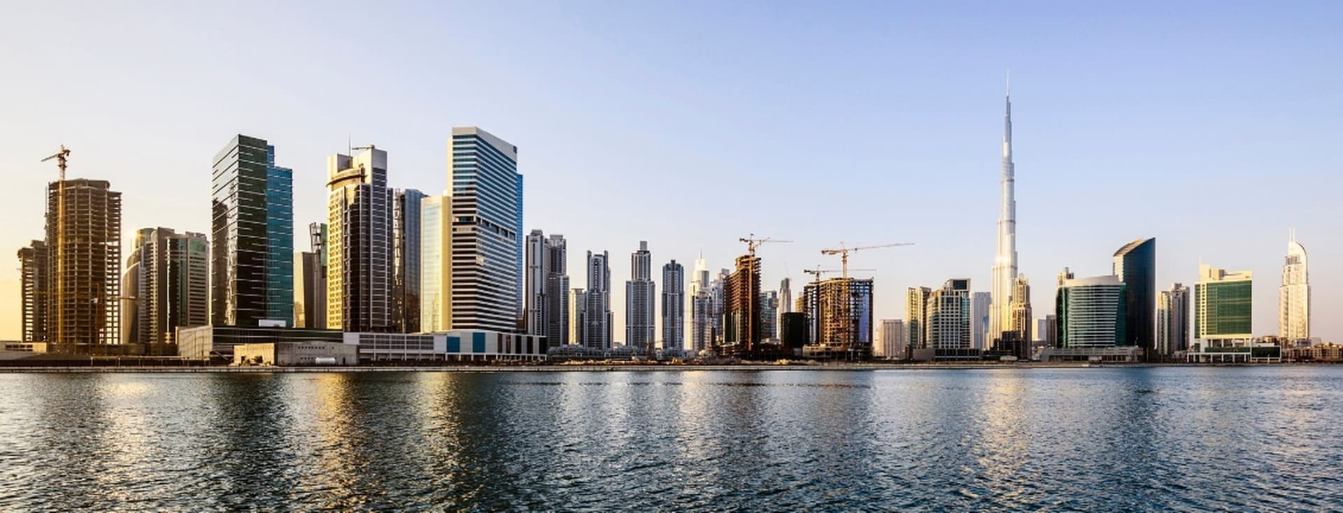 Dubai water canal and investment properties in Business Bay and Downtown Dubai