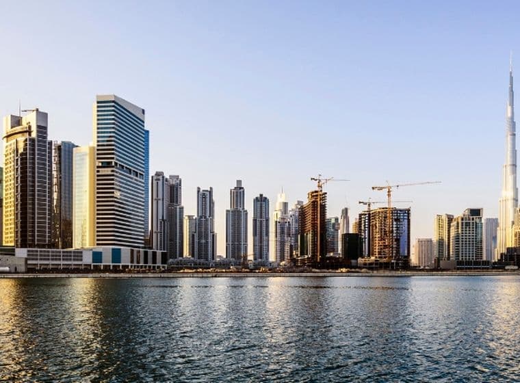Dubai water canal and investment properties in Business Bay and Downtown Dubai