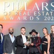 Engel & Volkers Dubai Team receiving the Real Estate Agency Of The Year award at the Pillars Of Real Estate Awards
