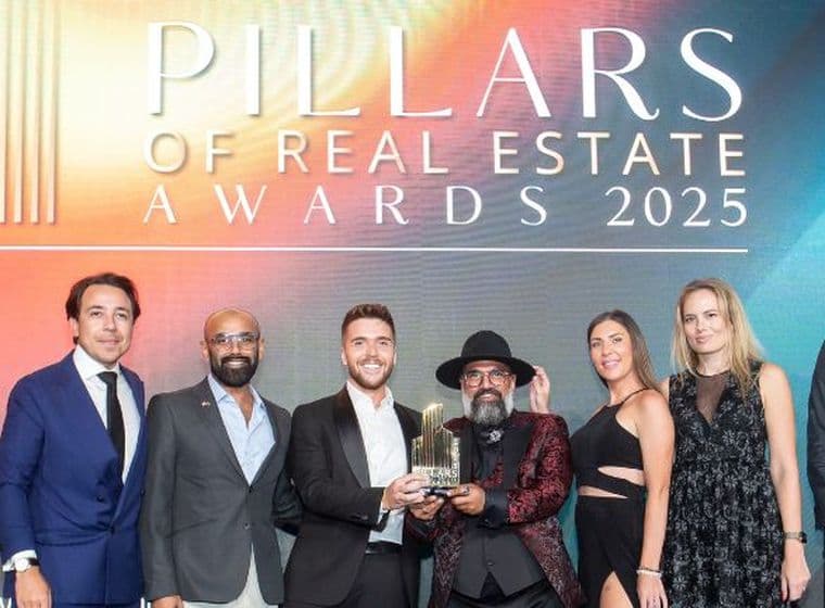 Engel & Volkers Dubai Team receiving the Real Estate Agency Of The Year award at the Pillars Of Real Estate Awards