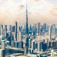 Dubai skyline with growth in transactions facilitated by Emirates Real Estate Solutions