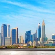 Panoramic shot of some of Dubai's most famous buildings including Burj Khalifa and the Emirates Towers