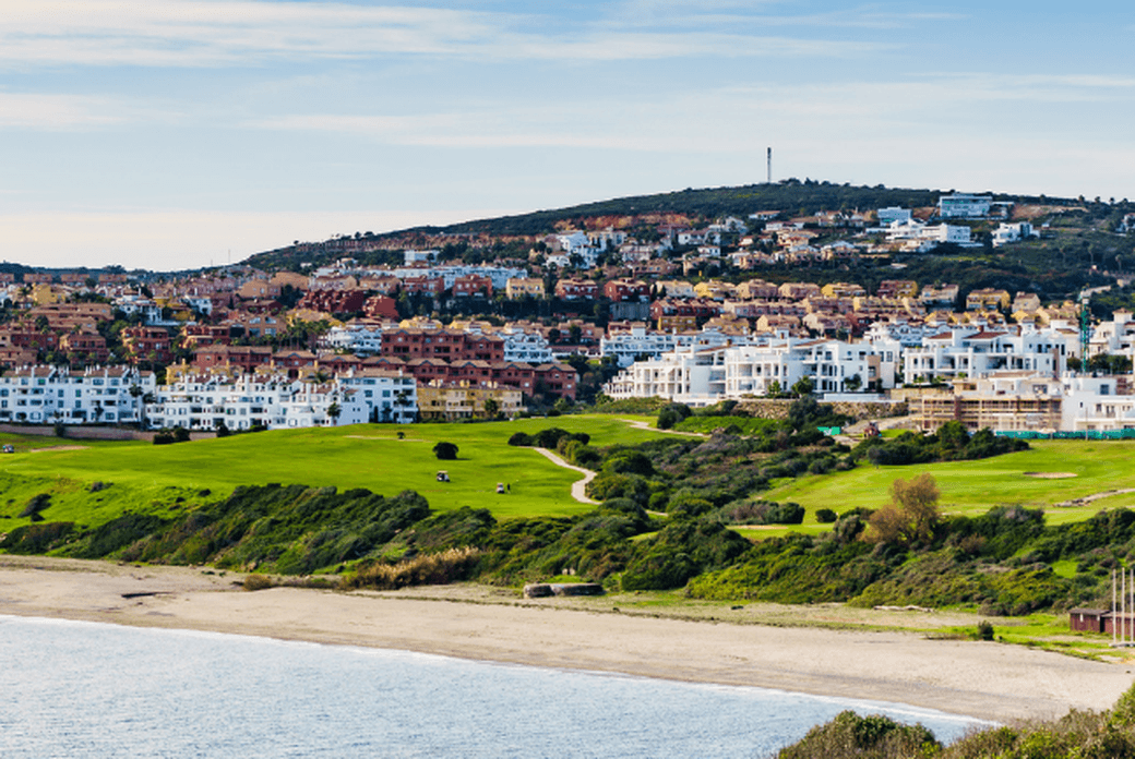 Costa de la Alcaidesa - sea view, its beach, and the housing development.