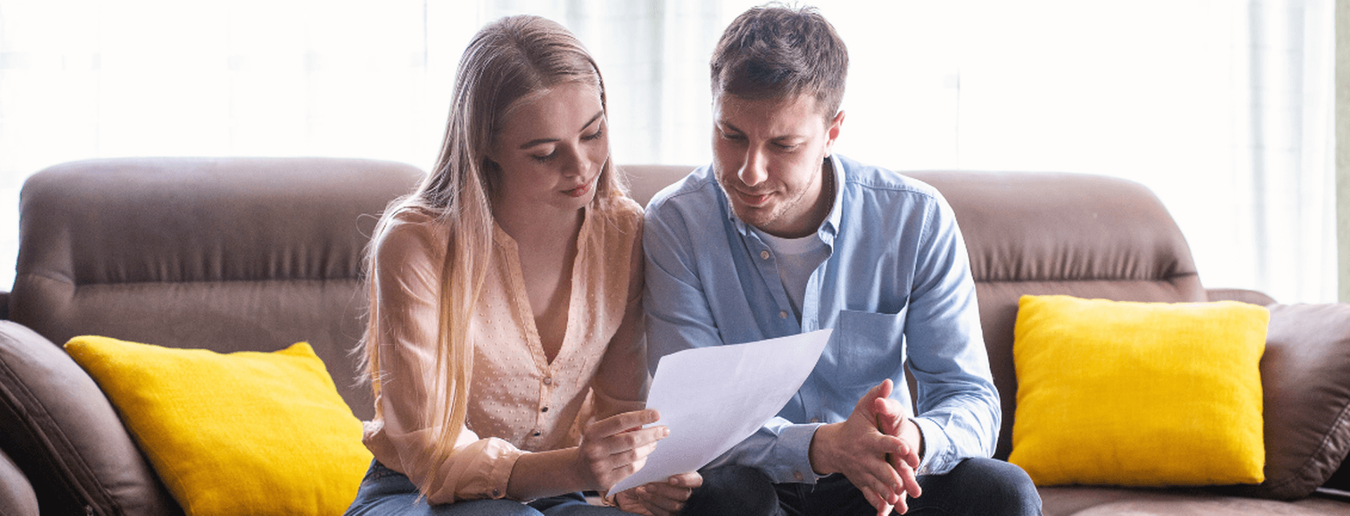 couple reviewing tenancy contract in Dubai apartment