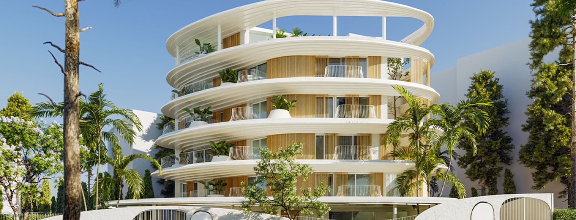 Το εξωτερικό μέρος ενός κτιρίου, περιτριγυρισμένο από πράσινο