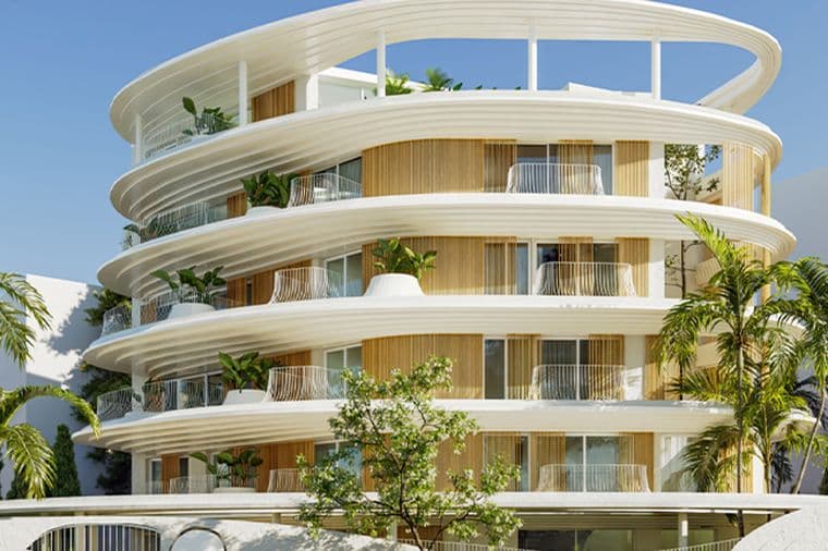 Το εξωτερικό μέρος ενός κτιρίου, περιτριγυρισμένο από πράσινο