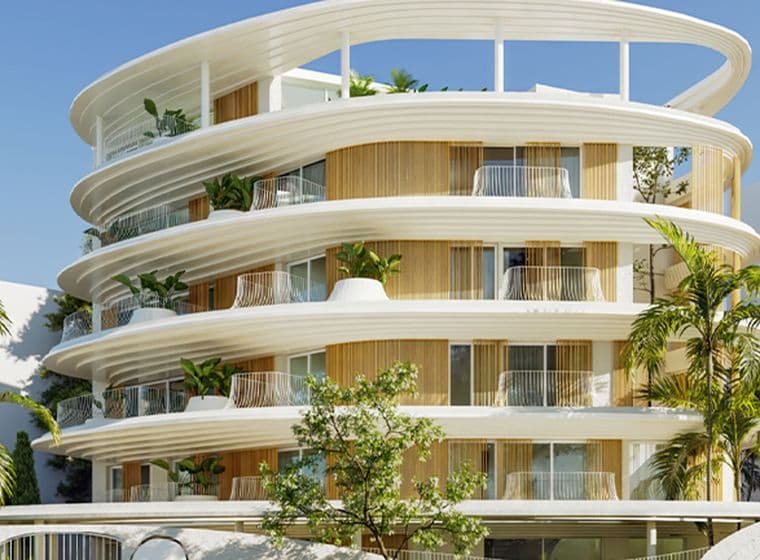 Το εξωτερικό μέρος ενός κτιρίου, περιτριγυρισμένο από πράσινο