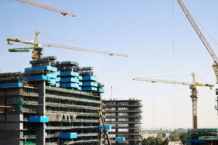 Contemporary apartments under construction in a prime Business Bay location, showcasing the benefits of buying off-plan property in Dubai.