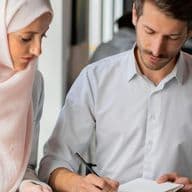 Mortgage broker and client discuss Islamic Mortgage in Dubai