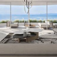 Luxury living room with panoramic sea views, minimalist design, and large glass windows