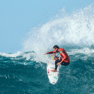 A surfer riding a wave
