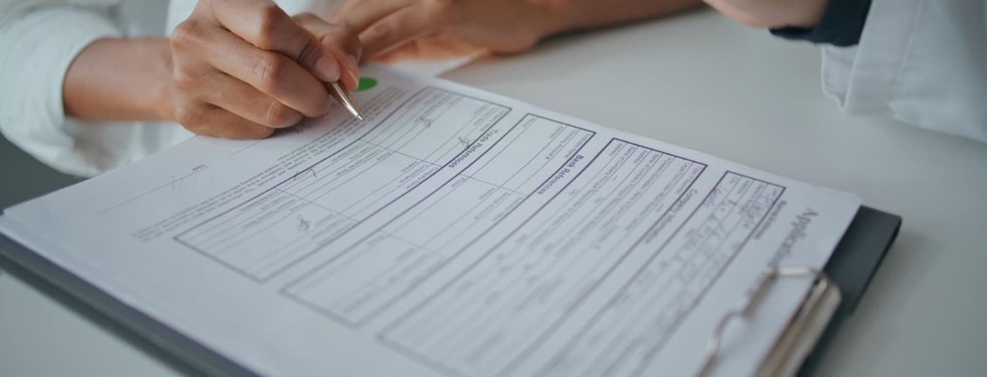 person reads over RERA forms before signing