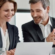 Real estate agent discusses a post-handover payment plan for an off-plan property purchase with their client