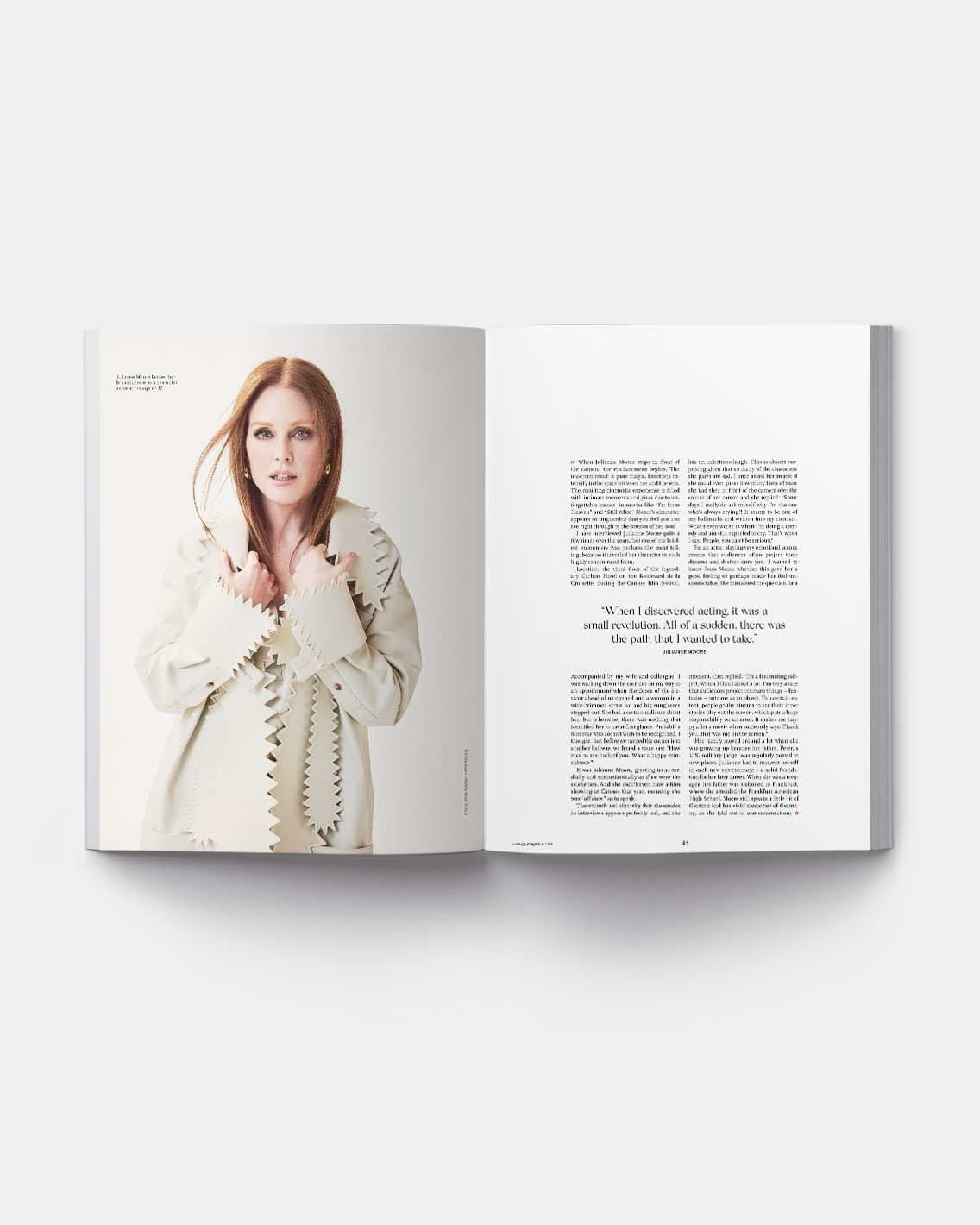 Open magazine spread: left-page portrait of a woman in a light coat with zigzag trim; right page columns of article text.