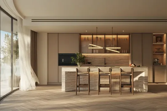 Modern kitchen with a marble island, three wooden stools, floor-to-ceiling windows, sheer curtains, and sleek cabinetry with subtle lighting.