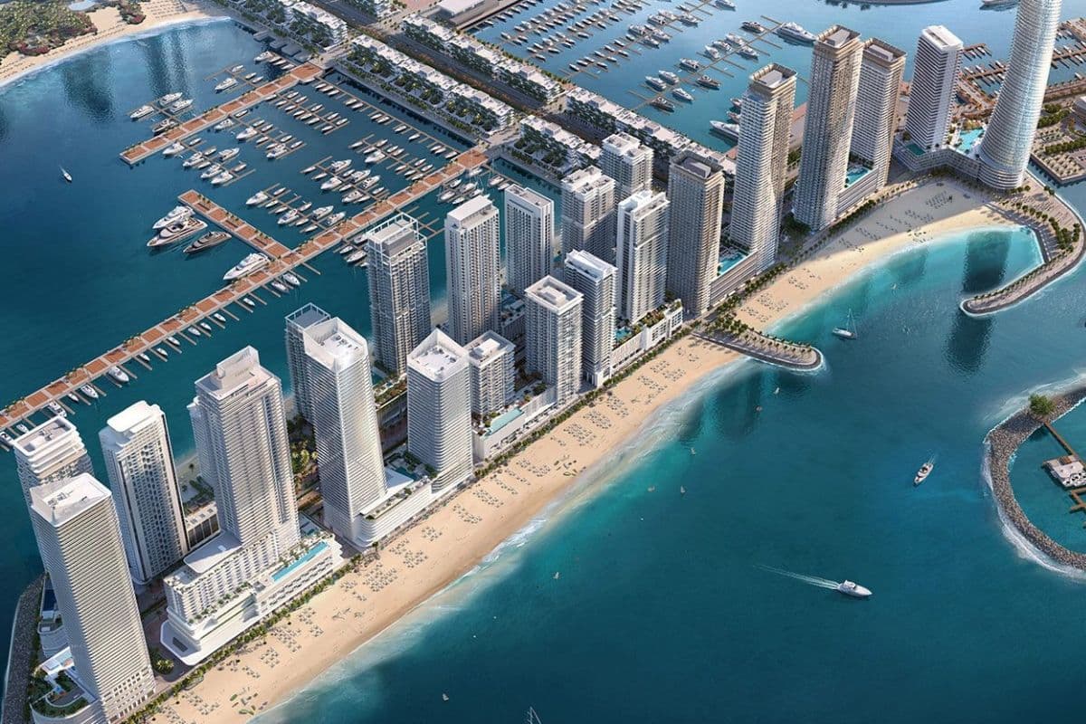 Emaar Beachfront aerial view showing planned apartment buildings, beach, and marina, an emerging neighborhood in Dubai.