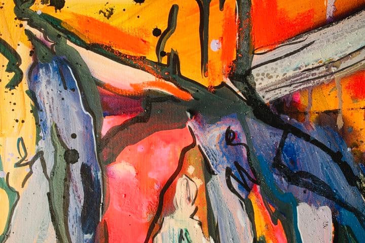 Abstract painting with vibrant colors and bold brushstrokes, characterized by splashes of orange, blue, and pink, as well as dynamic black lines.