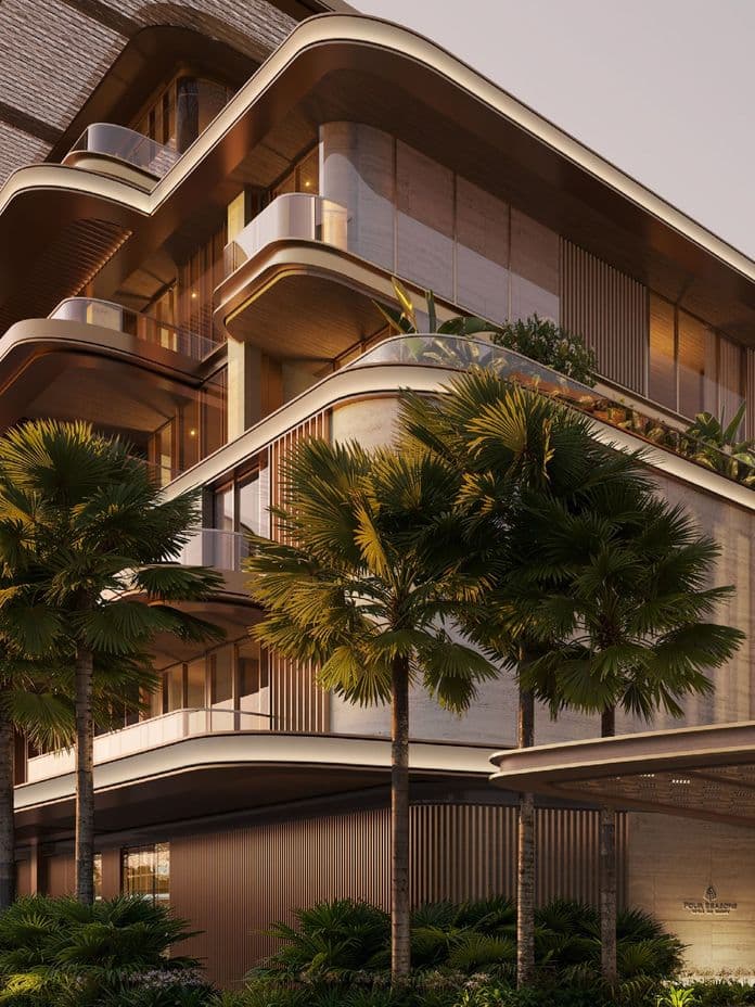 Modern building with curved balconies and glass railings, surrounded by tall palm trees and lush greenery under soft evening light.