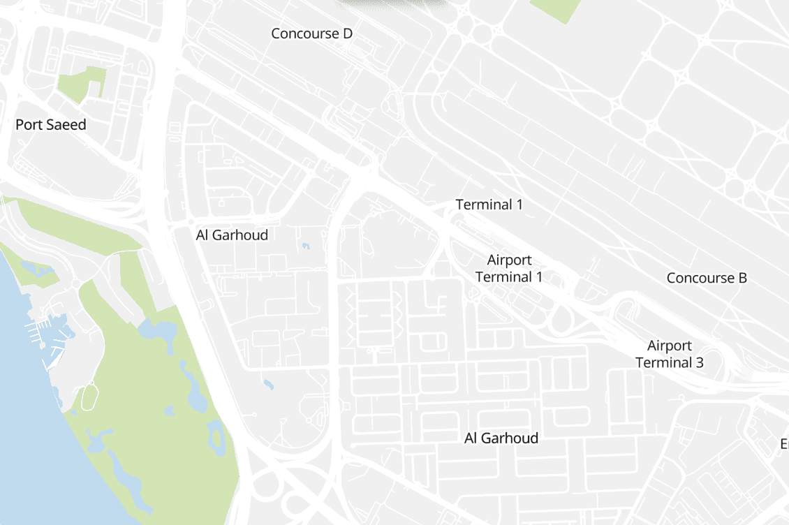 Map showing Dubai Airport region with terminals and surrounding areas, including Al Garhoud and Port Saeed.