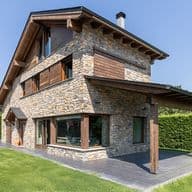 House with porch and private garden.