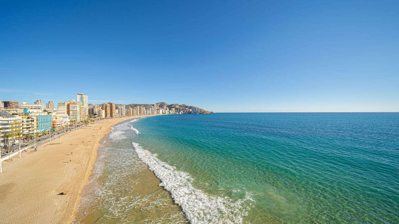 Aerial view from a drone of Levante Beach and the city of Benidorm.