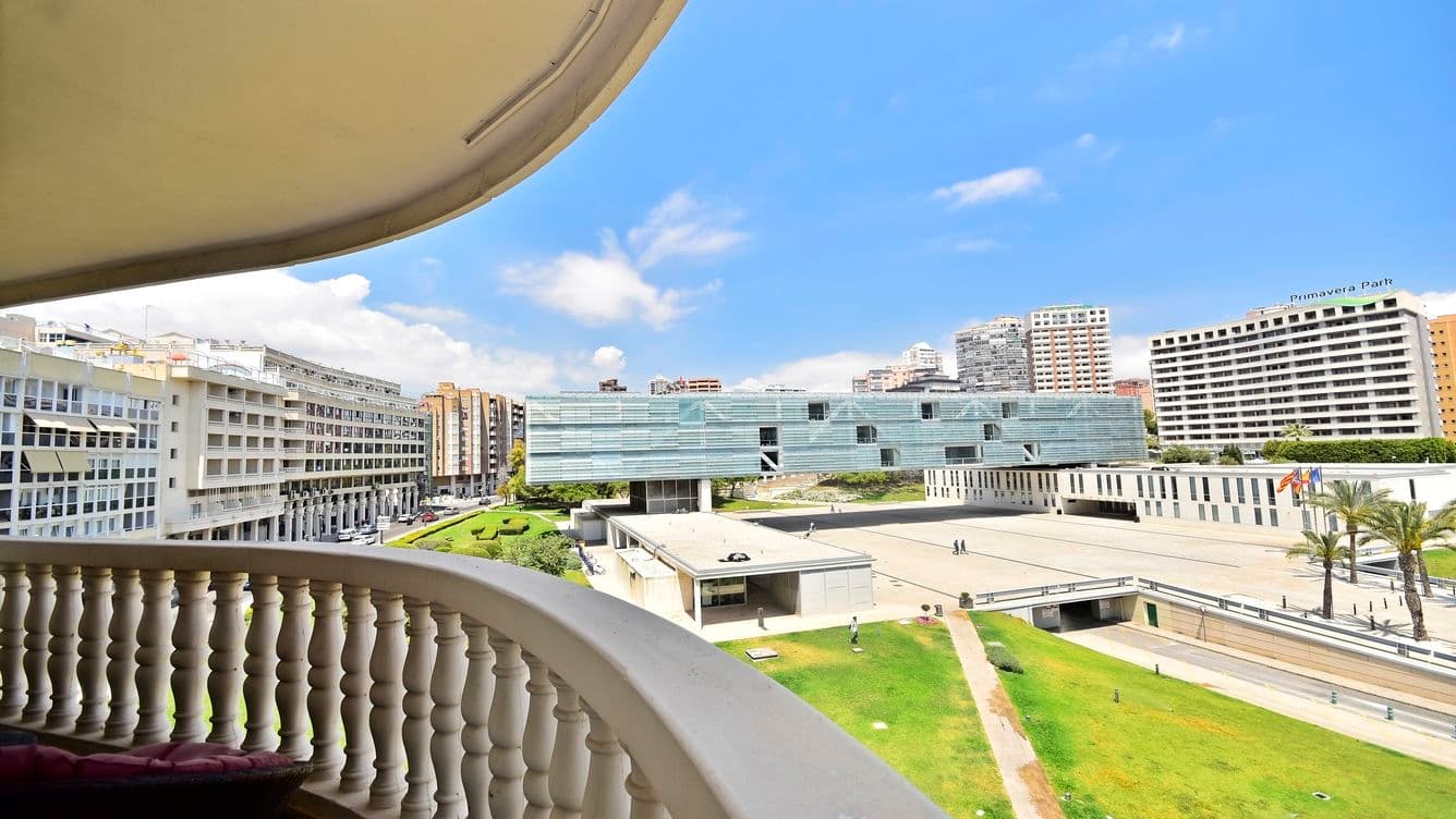 Old town and townhall of Benidorm - view from a balcony of the modern townhall and other buildings mixed with old ones.