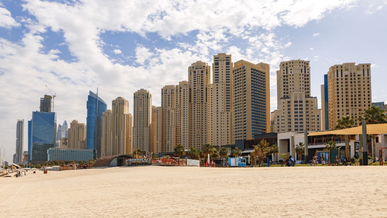 JBR Beach and surrounding apartment buildings, developed by Dubai Properties, highlighting beachfront living in Dubai