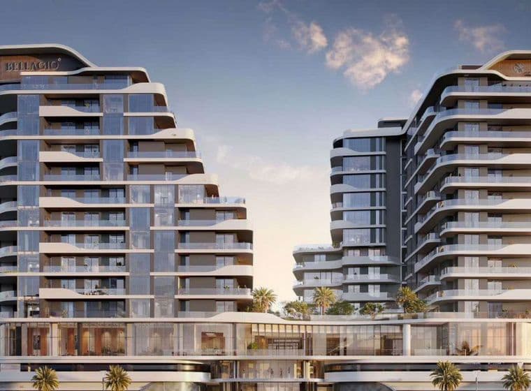 Bellagio building exterior with curved architectural lines, layered balconies, and landscaped surroundings.