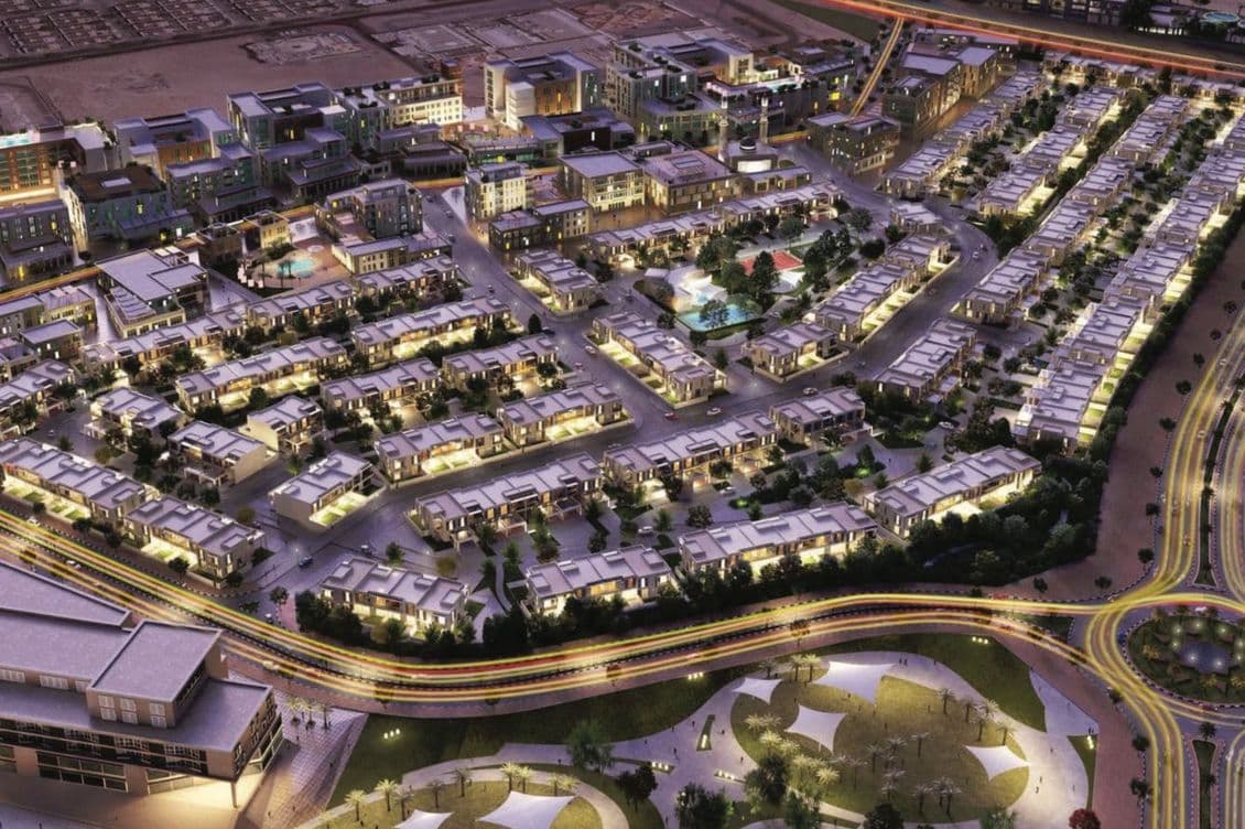 Wasl Community mit Grünbereichen, Gehwegen und Wohngebäuden.