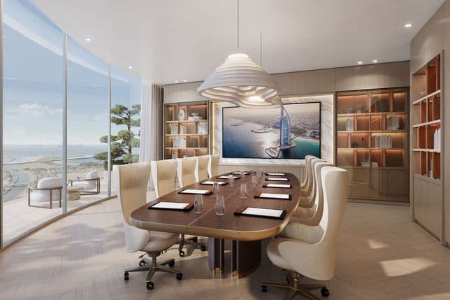Luxurious boardroom with a long wooden table, cream chairs, curved glass walls offering an ocean view, a large screen, and warm-lit shelves.