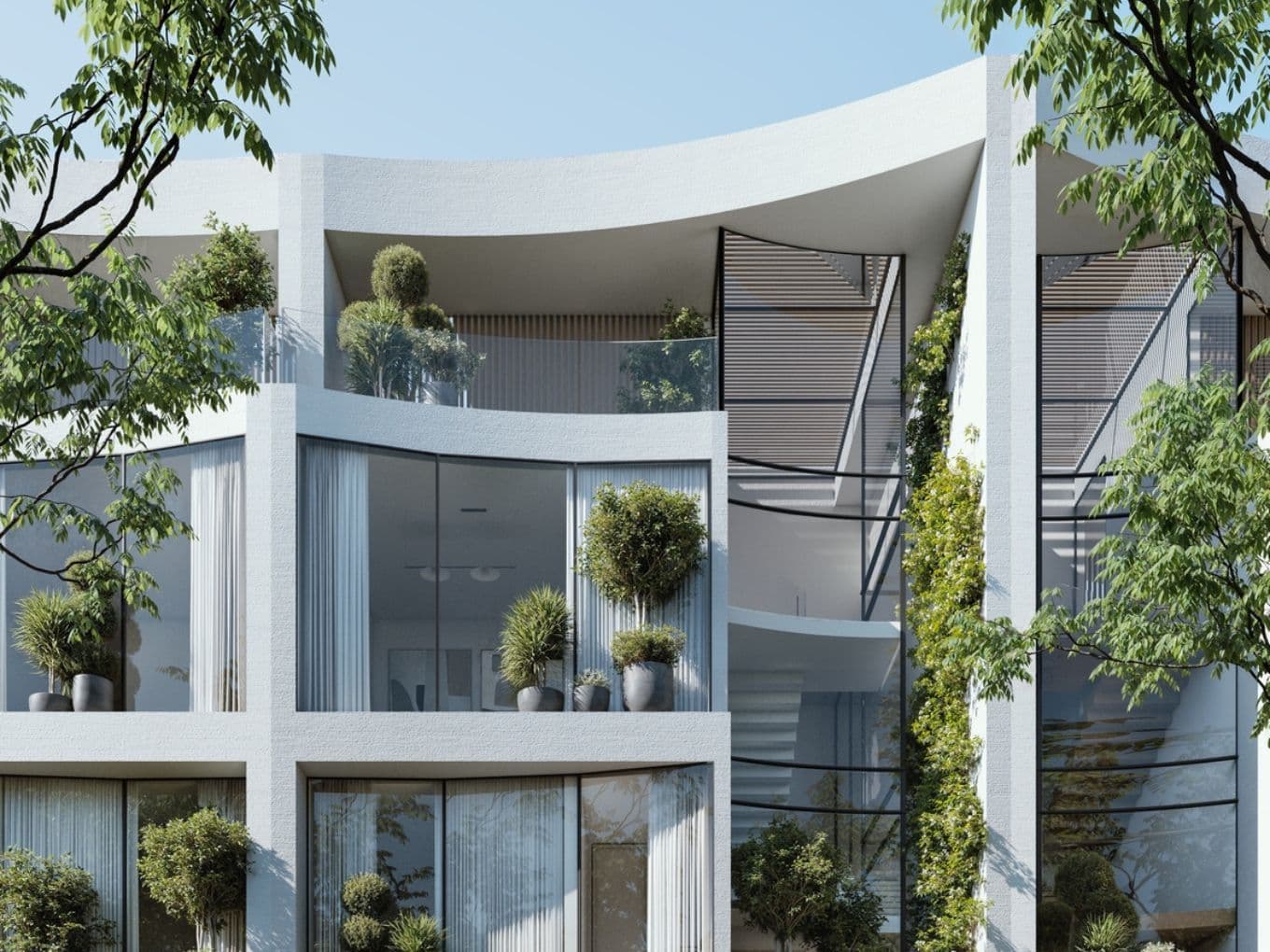 Modernes weißes Gebäude mit großen Fenstern, geschwungener Fassade und Balkonen mit Topfpflanzen, umgeben von Grünflächen.