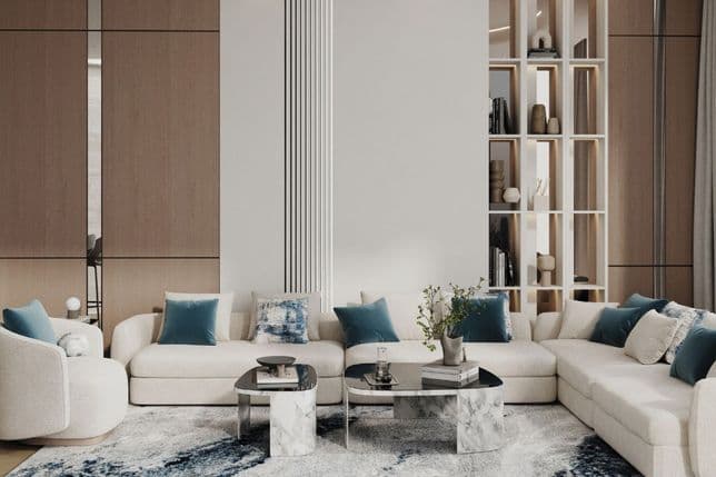 Interior image of a modern Binghatti Circle apartment featuring marble accents, integrated shelving, and a luxury workspace.