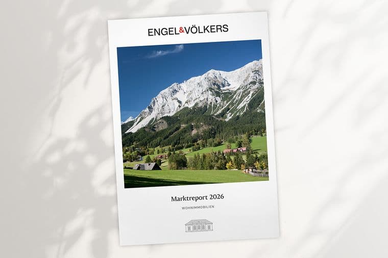 Engel & Völkers report cover showing alpine landscape: green valley, chalets, forest and snow‑capped mountains, titled "Marktreport 2026".