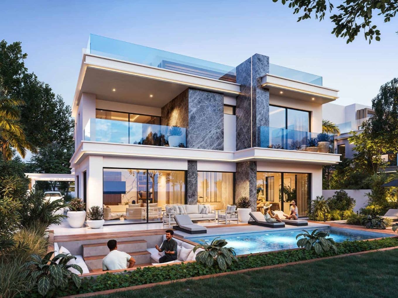 Modern two-story house with large windows, a pool, and outdoor seating area. People relax by the pool surrounded by lush greenery at dusk.