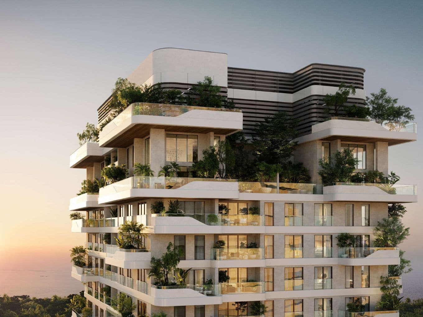 Exterior of the Talea residential tower with layered terraces, lush greenery on every level, and contemporary architecture against a sunset sky.
