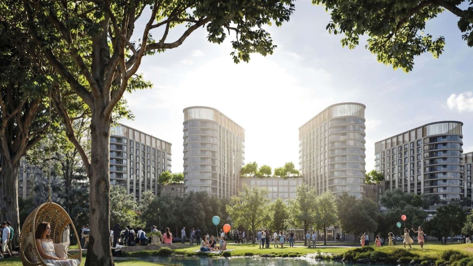 A serene urban park with a woman in a hanging chair under trees, people enjoying a pond with swans, and modern buildings in the background.