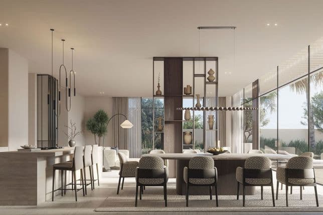 Contemporary dining and kitchen space in an Anantara Mina villa with floor-to-ceiling windows.