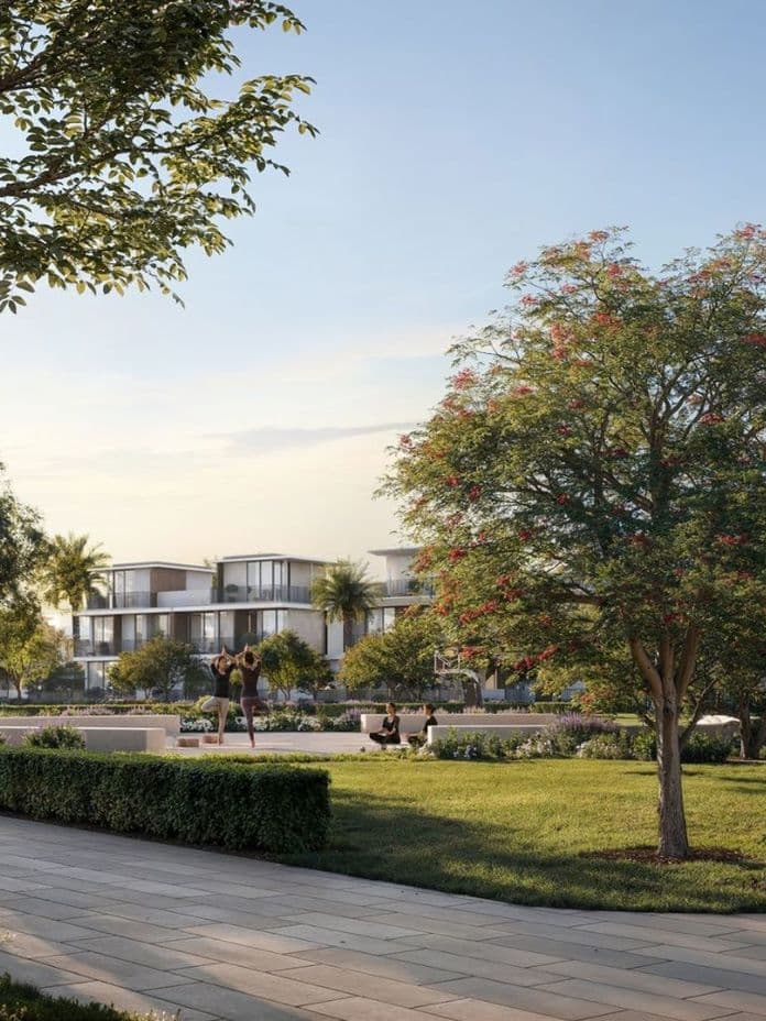 Green community jogging path at Selvara Grand Polo Club Emaar with modern villas in background