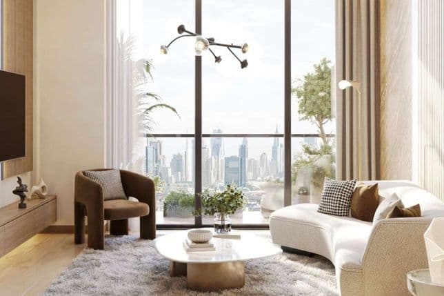Modern living room with a white couch, brown armchair, and cityscape view through large windows. Decor includes a rug, plants, and wall art.