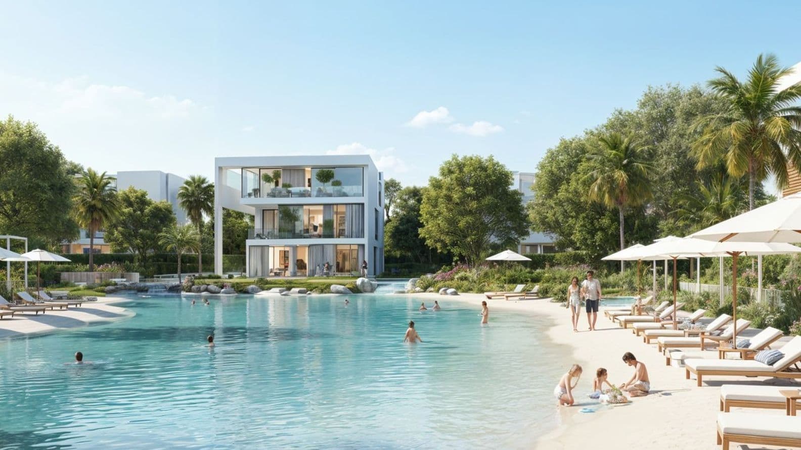 A serene beach scene with people relaxing by a clear, blue lagoon. Modern white buildings and lush greenery are in the background under a clear sky.
