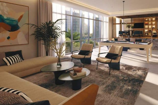 Luxurious lounge with seating area and pool table overlooking Dubai Marina skyline at Residences Du Port.